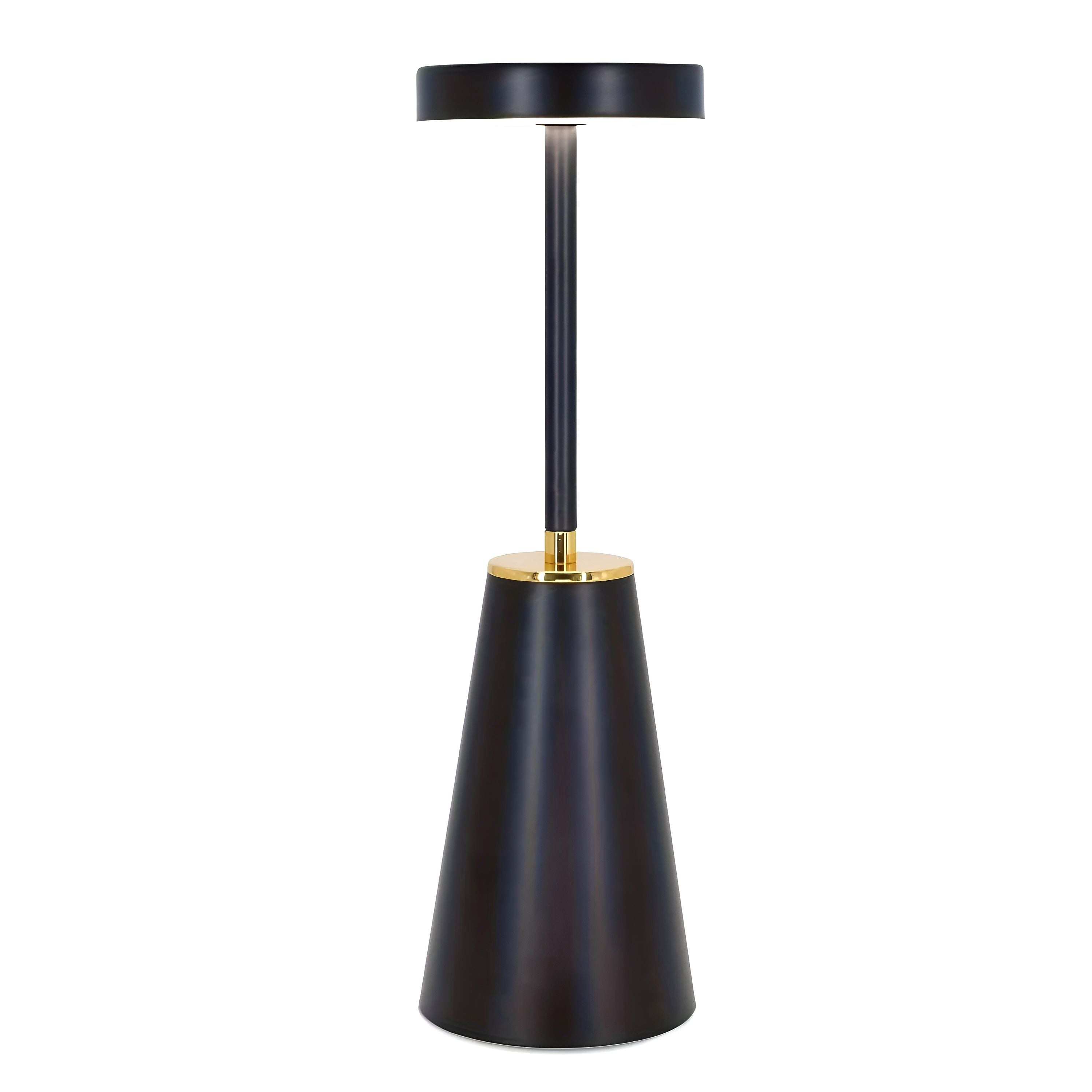 A single black Lumiere Essence wireless rechargeable table lamp with a gold accent, illuminated and standing upright on a clean white background.