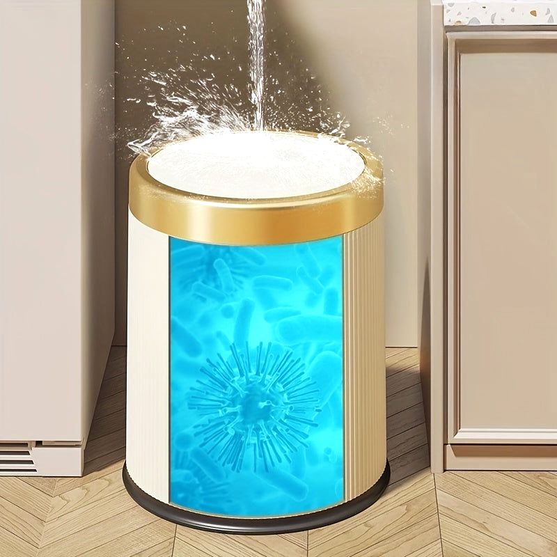 Cream Elegance Oval Waste Solution trash can with a press-top lid and gold rim, depicted with water splashing into it and a graphic overlay showing bacteria and viruses, illustrating its hygienic properties.