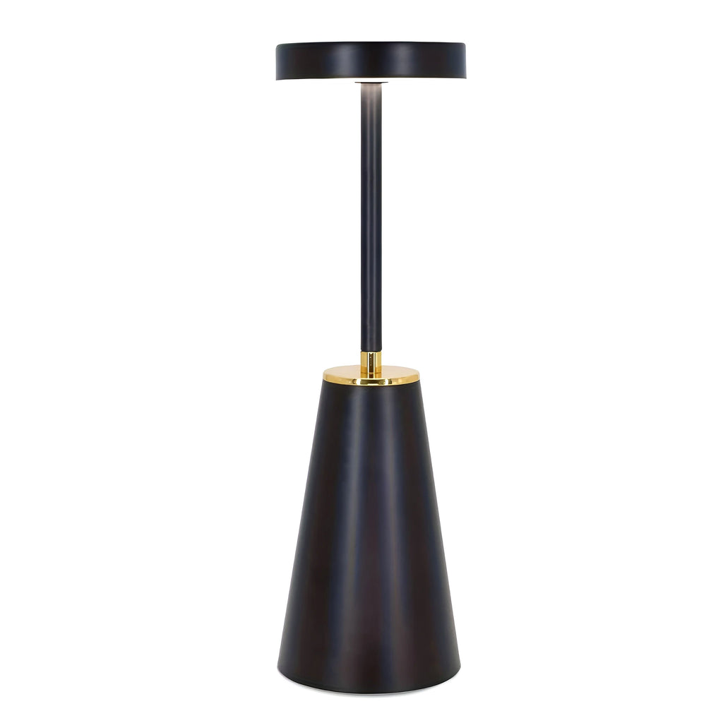 A single black Lumiere Essence wireless rechargeable table lamp with a gold accent, illuminated and standing upright on a clean white background.