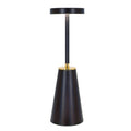 A single black Lumiere Essence wireless rechargeable table lamp with a gold accent, illuminated and standing upright on a clean white background.
