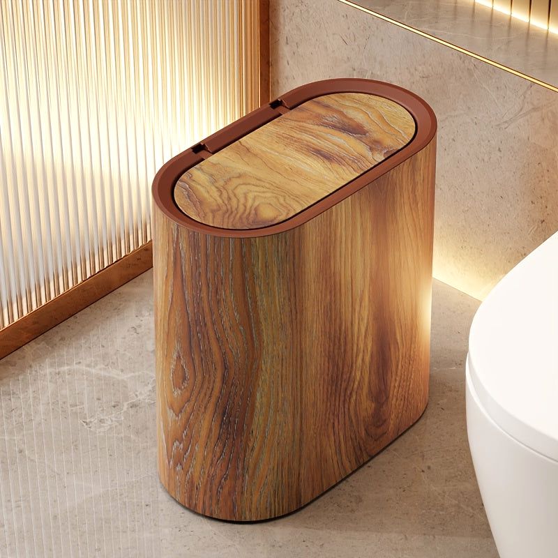 A single Luxe Marble Canister in Imitation Wood Grain, an elegant trash solution for a modern bathroom. This stylish waste bin features a secure lid and contemporary design.